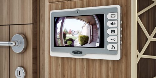 Video entryphone system installed on the wall next to the door.